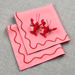 Gift Set: 2 squiggle Napkins in pink/red & 2 Lobster Napkinrings