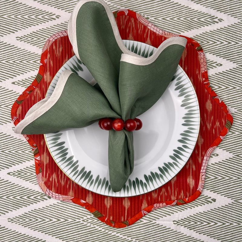 Table Set: Red Ikat Scallop & Green & Ivory Napkin with Red Orb Napkinring Table Setting